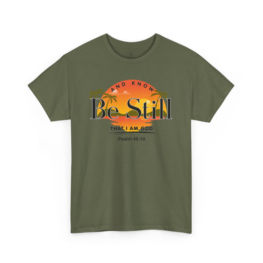 Christ Centered Faith men's Christian T-shirt with "Be Still And Know That I Am God" and Psalm 46:10 Bible verse text in black over retro multicolor island, sun and palm tree design on military green background.