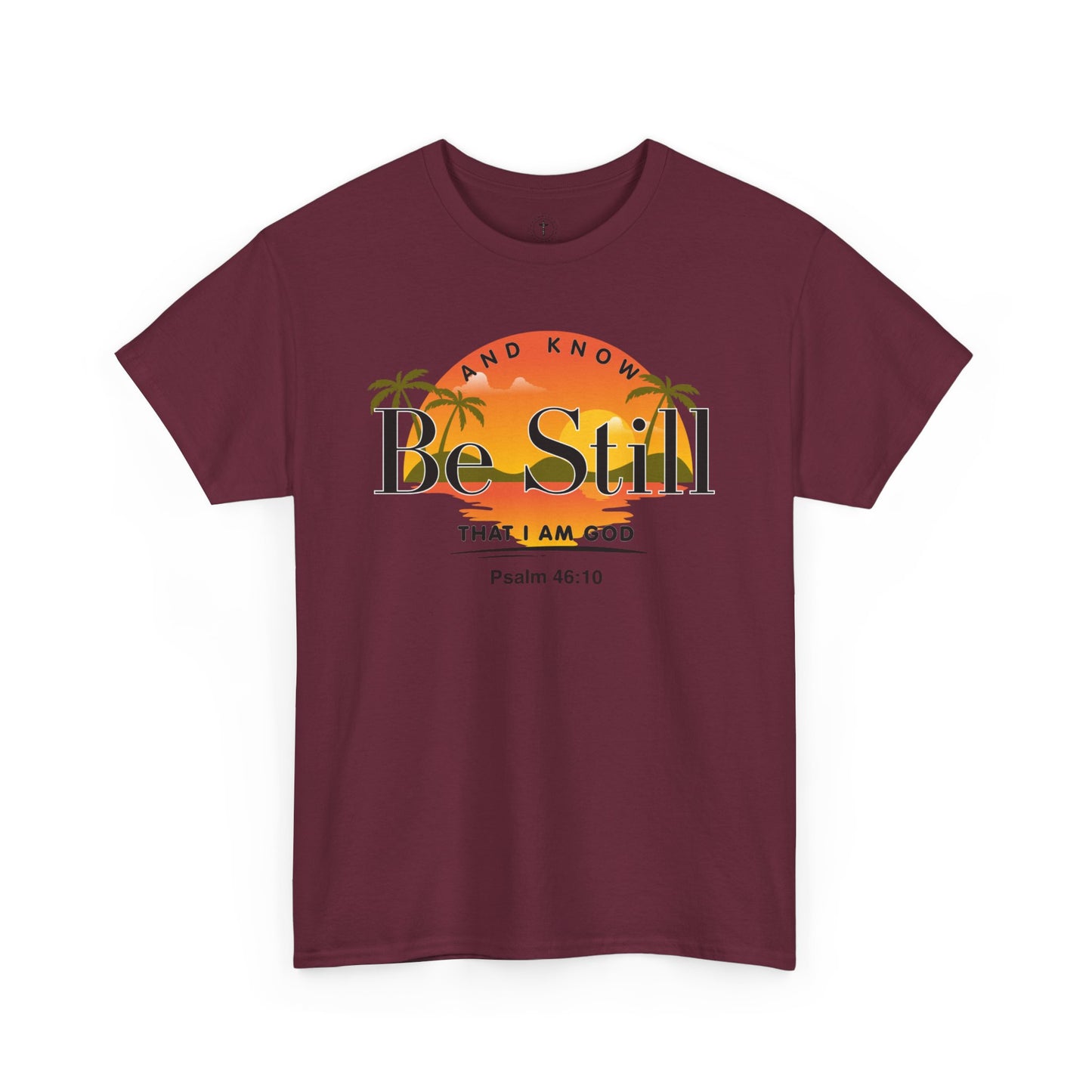 Christ Centered Faith men's Christian T-shirt with "Be Still And Know That I Am God" and Psalm 46:10 Bible verse text in black over retro multicolor island, sun and palm tree design on maroon background.