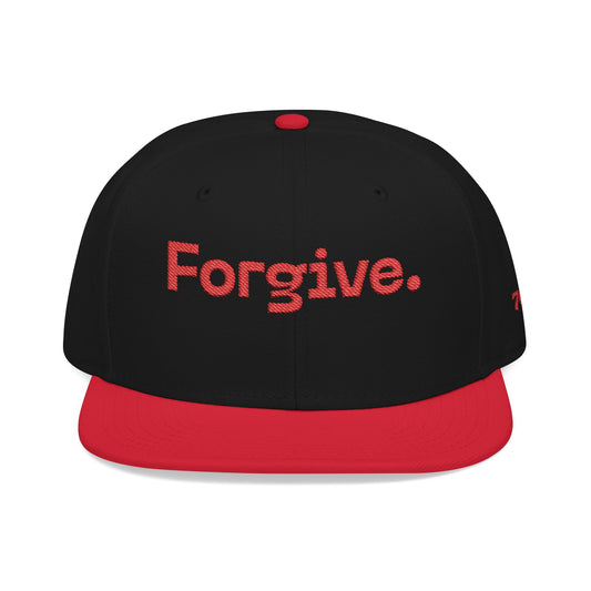 Christ Centered Faith unisex Christian flat brim snapback hat with "Forgive" text embroidered in red with red brim on black background.