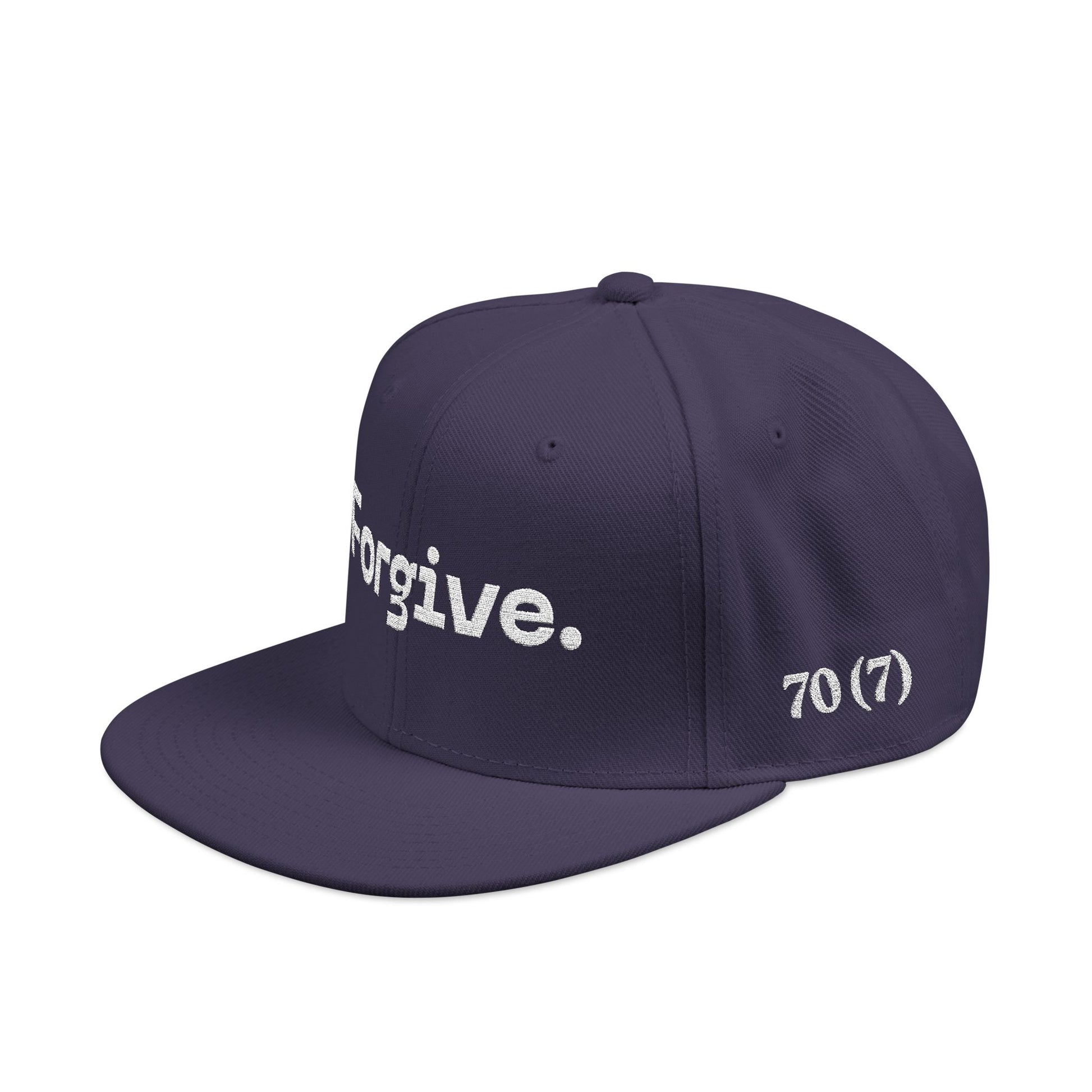 Christ Centered Faith unisex Christian flat brim snapback hat with "Forgive" and "70 (7)" text embroidered in white on navy background, side view.