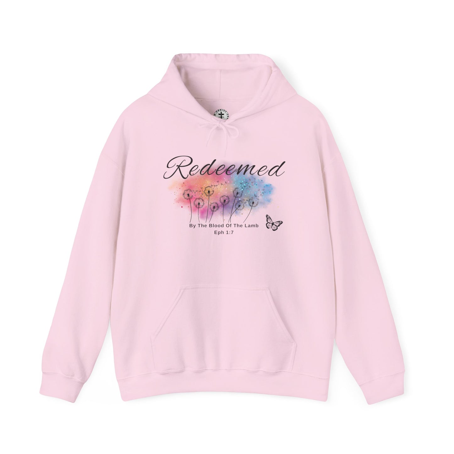 Christ Centered Faith women's Christian hoodie with "Redeemed By The Blood Of The Lamb" and Ephesians 1:7 Bible verse text in black over a multicolor watercolor mark with black butterfly and dandelions on pink background.