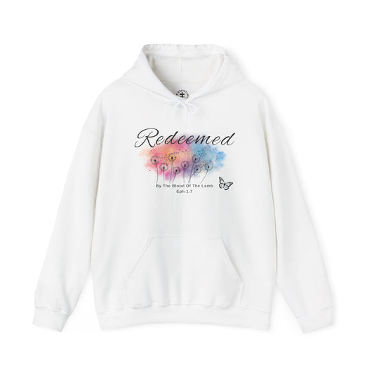 Christ Centered Faith women's Christian hoodie with "Redeemed By The Blood Of The Lamb" and Ephesians 1:7 Bible verse text in black over a multicolor watercolor mark with black butterfly and dandelions on white background.