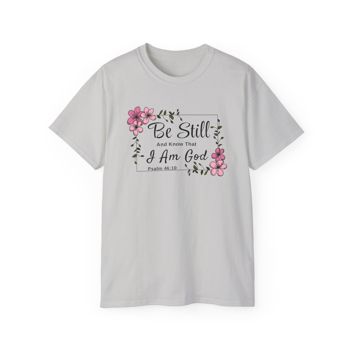 Christ Centered Faith women's Christian t-shirt with "Be Still And Know That I Am God" and Psalm 46:10 Bible Verse text in black with pink flowers and green vine on gray background.