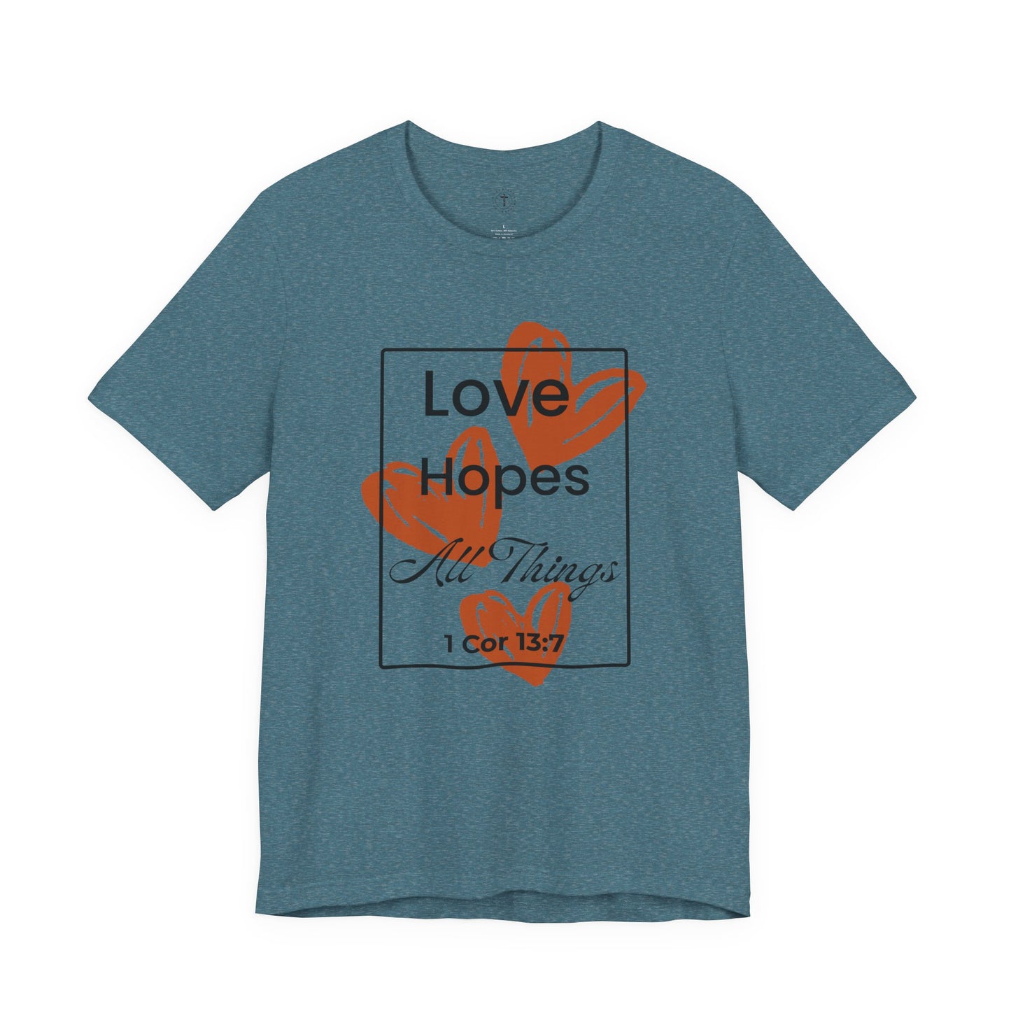 Christ Centered Faith women's Christian t-shirt with "Love Hopes All Things" and 1 Corinthians 13:7 Bible verse text in black over red hearts inside a black rectangle outline on blue background.