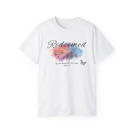 Christ Centered Faith women's Christian T-shirt with "Redeemed By The Blood Of The Lamb" and Ephesians 1:7 Bible verse text in black over a multicolor watercolor mark with black butterfly and dandelions on white background.